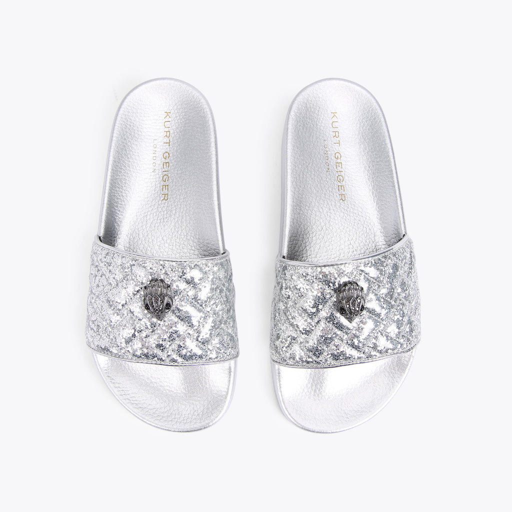 Meena Eagle Slide Sandals in Metallic Finish