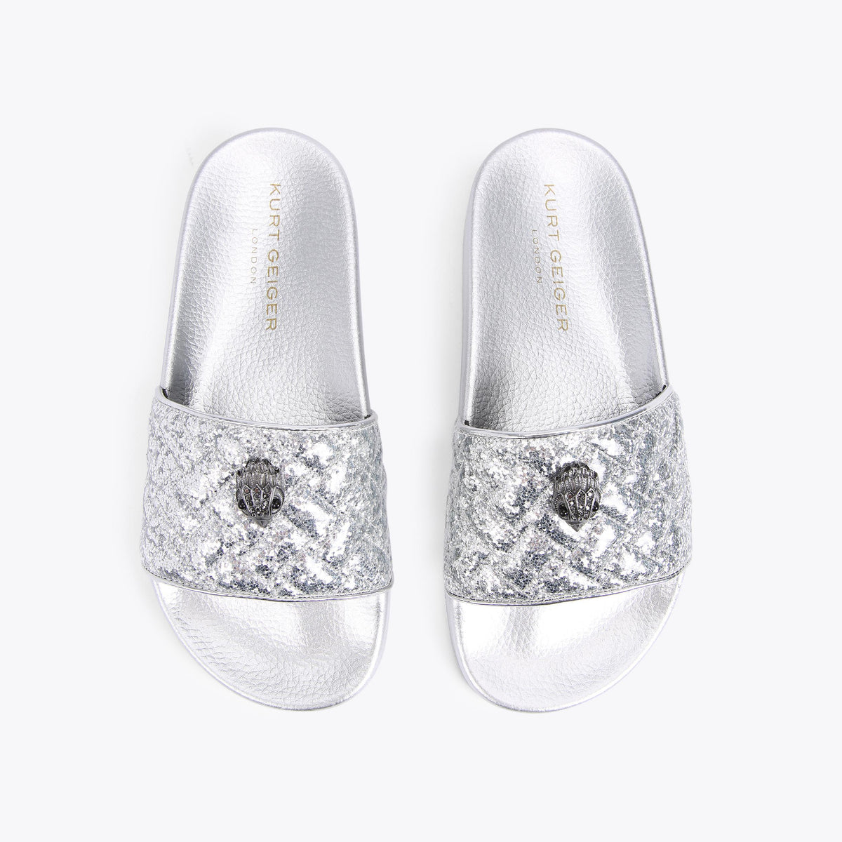 Meena Eagle Slide Sandals in Metallic Finish