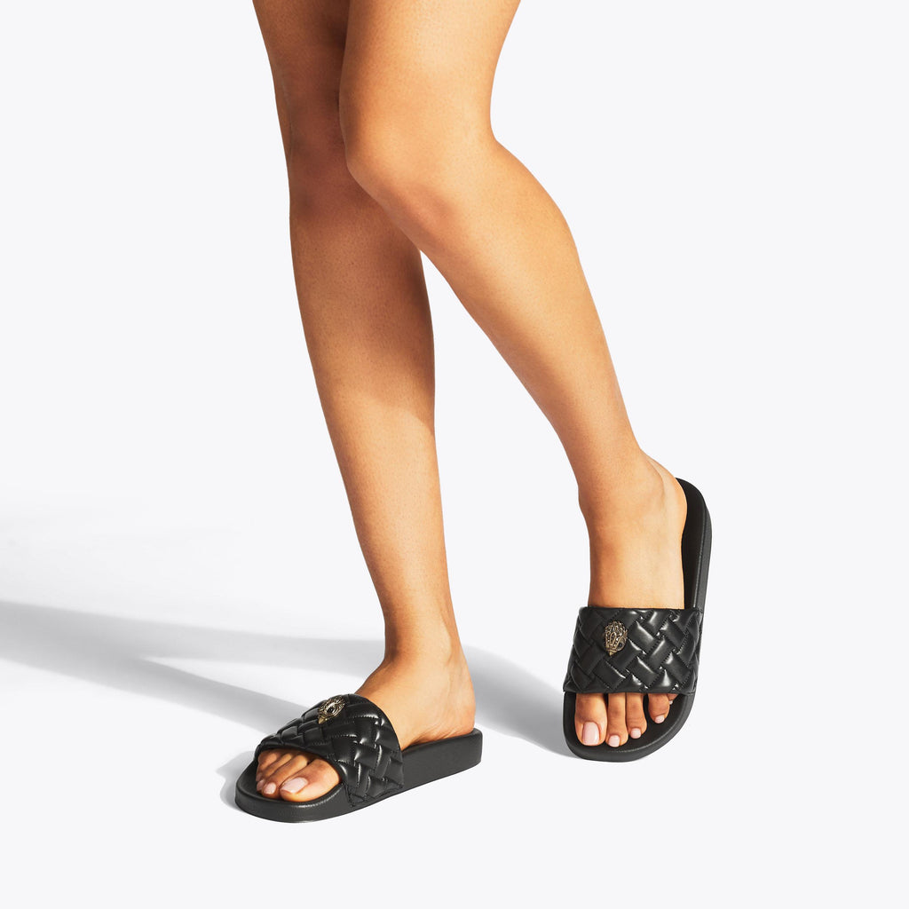 Meena Eagle Flat Slide Sandals in Black