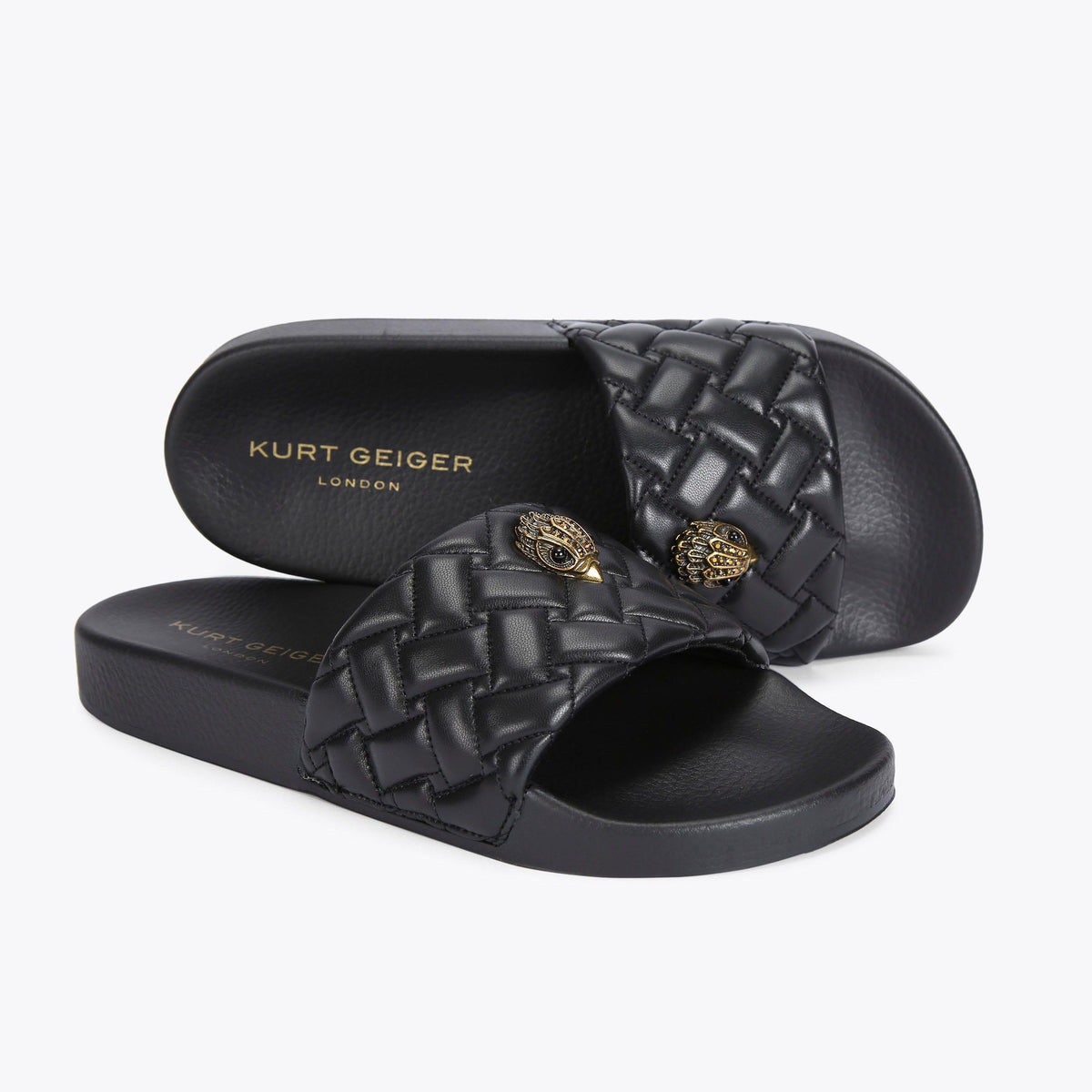 Meena Eagle Flat Slide Sandals in Black
