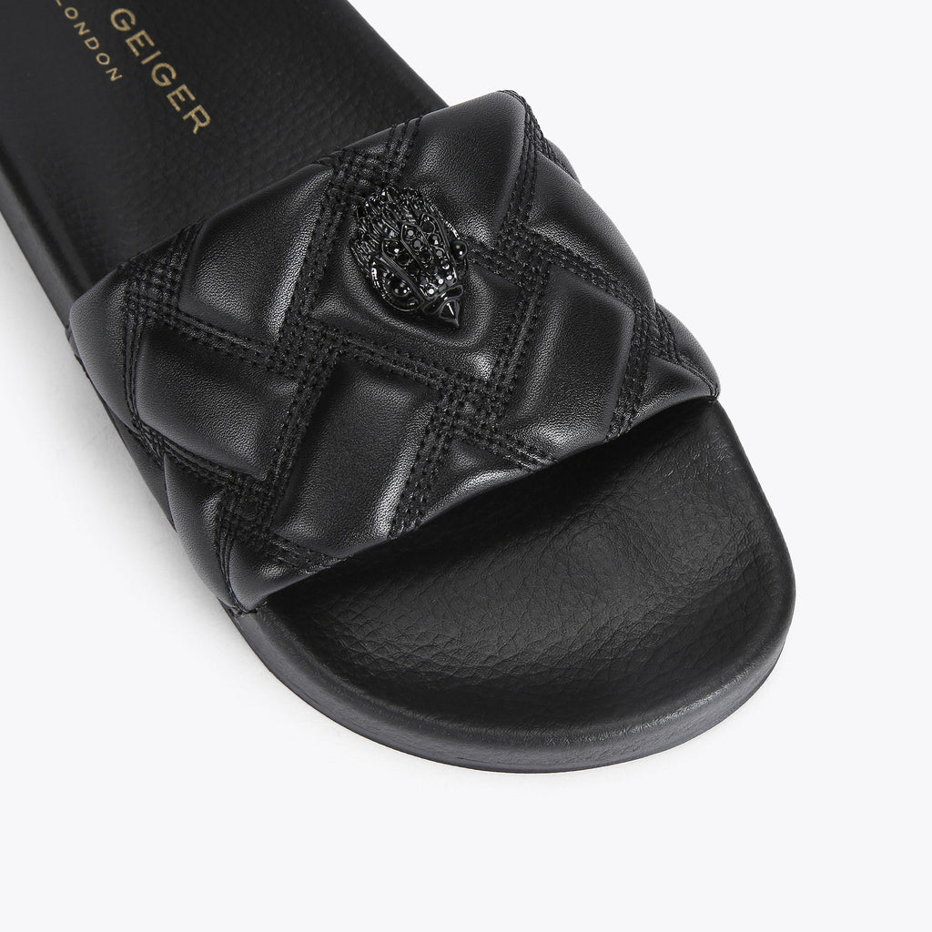 Meena Eagle Drench Slide Sandals in Black